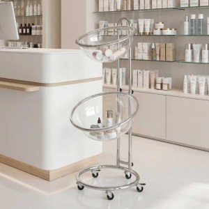 espositore da terra con due mezze sfere in plexiglass in una farmacia - DANIELI