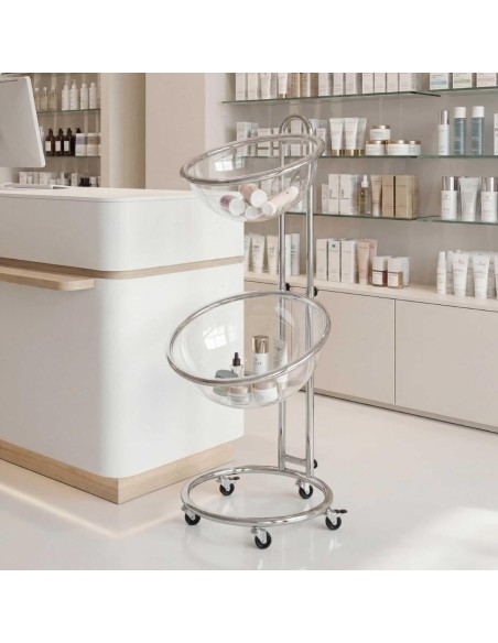 espositore da terra con due mezze sfere in plexiglass in una farmacia