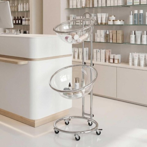 espositore da terra con due mezze sfere in plexiglass in una farmacia - DANIELI