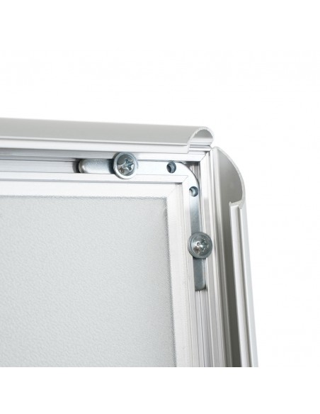 Apertura cornice a scatto